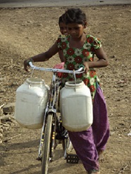 girl fetching water