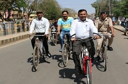 Environment  health  bicycle  save fuel  office  ride  Ashoknagar  Madhya Pradesh  example