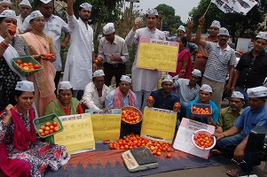 AAP  price rise  essential commodities  pulses  tomatoes  office of profit