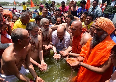Under fire, BJP’s Dalit Snan becomes ‘Sant Samagam Snan’
